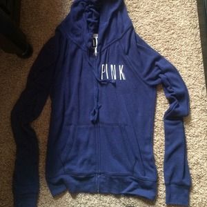 A Victoria secret navy blue zip up hoodie