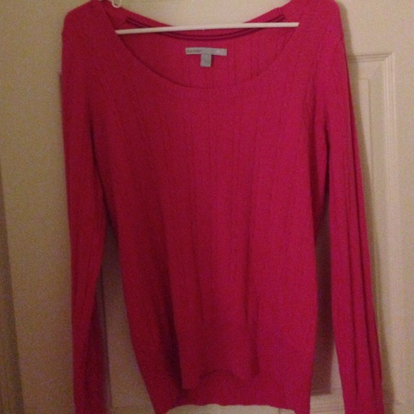 Pink cable sweater.