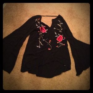 Floral tunic . Deep back . Draping sleeves