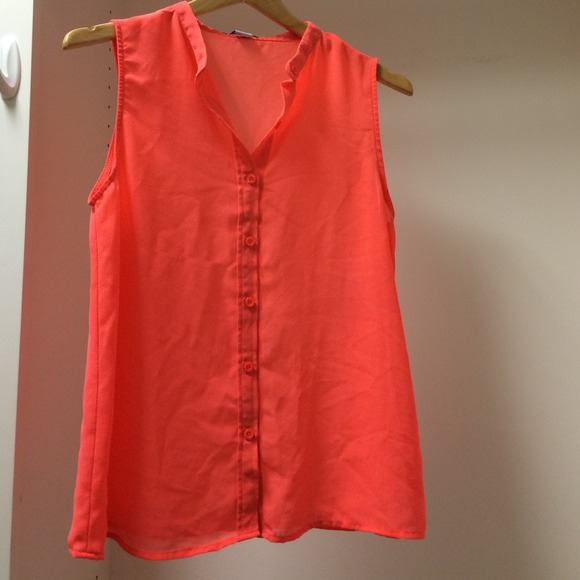 Neon pink sleeveless blouse!