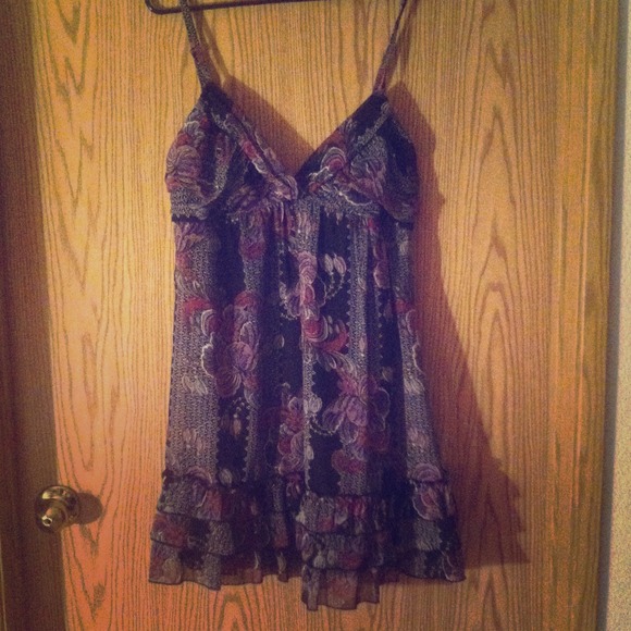 Baby doll dress with floral design.