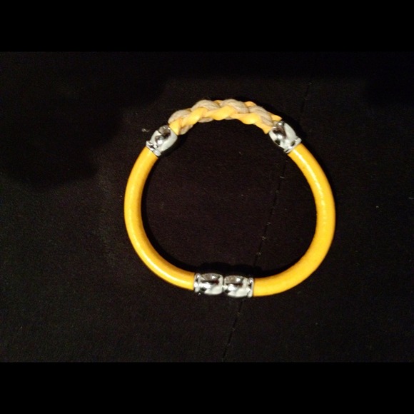 Yellow leather magnetic bracelet.