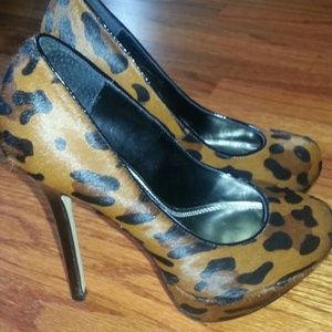Cheetah/leopard print platform heels.