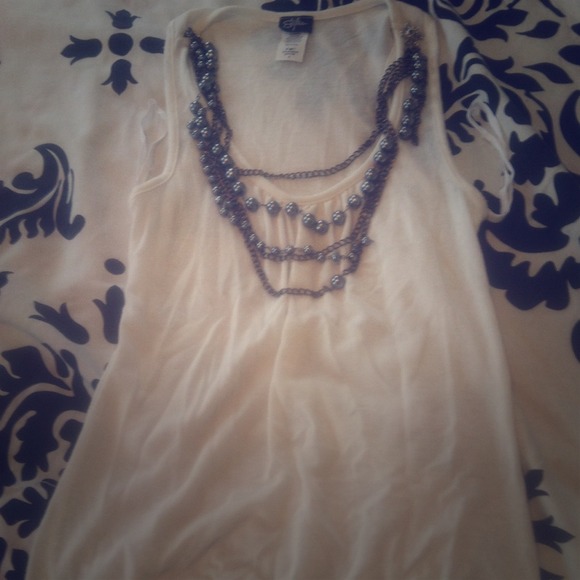 Cream colored flowy knit tank