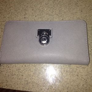 MK leather wrap around zipper wallet