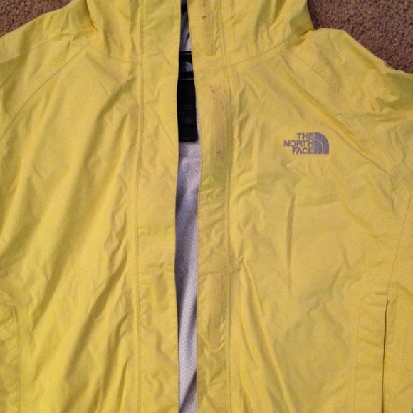 Yellow northface rain jacket and windbreaker