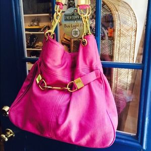 Pink faux leather bag with buckles