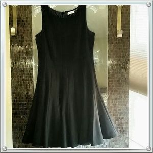 Basic black dress with a flair skirt