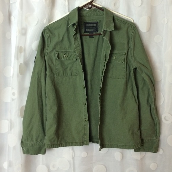 Green button up shirt