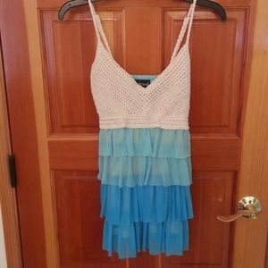 Blue ruffled tank top with crochet top