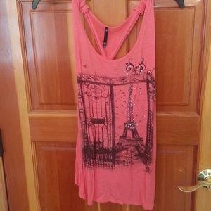 Pinkish-orange tank top with eiffel tower on it