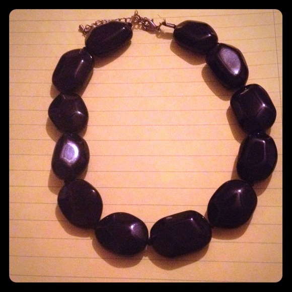 Vintage large oval flat plastic chocker 1960?