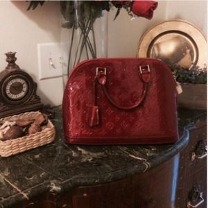 Lipstick red Alma vernis in monogram print handbag