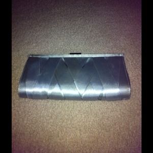 Used authentic Steve Madden clutch.
