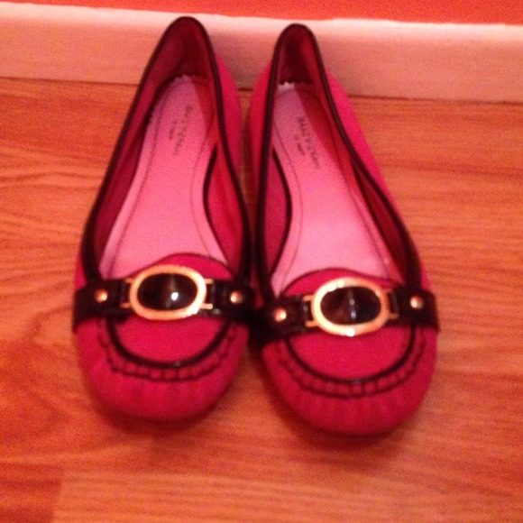 Pink and black flats