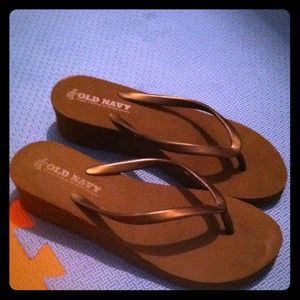 Brown flip flops