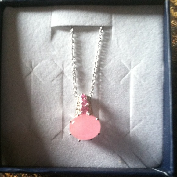 Silver necklace with a pink stone