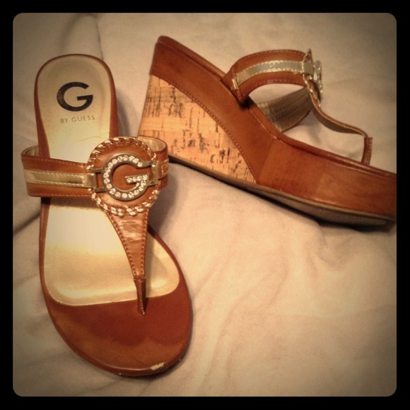 Size 7 1/2 Guess wedges.