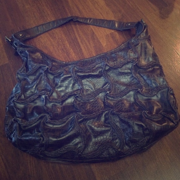 Cute brown fake alligator skin purse.