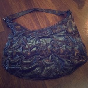 Cute brown fake alligator skin purse.