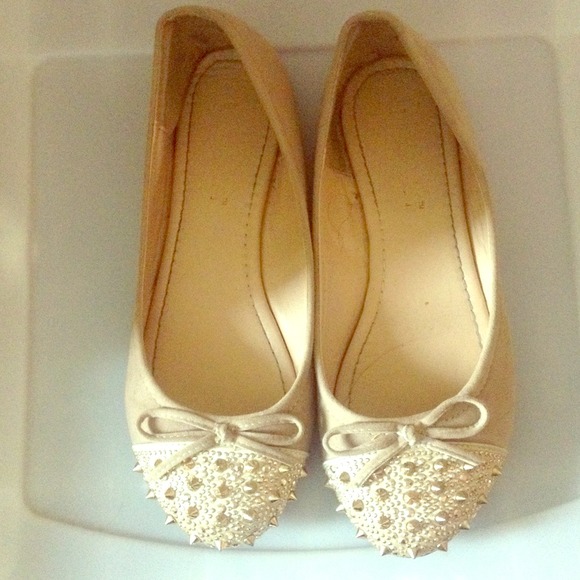 Nude, spiked ballerina flat