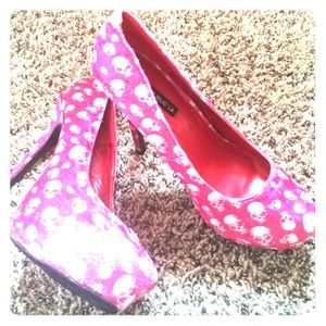 Hot pink heels with white skulls size 9