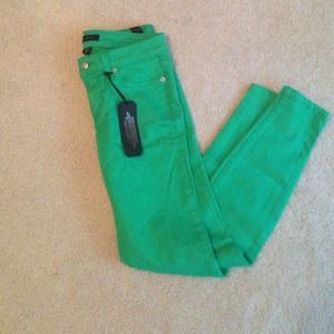 Green bebe skinny jeans