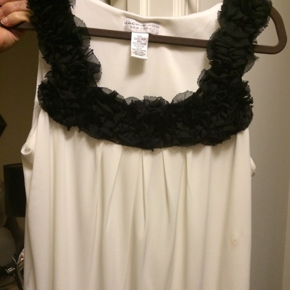 Classic white top with black rose neckline