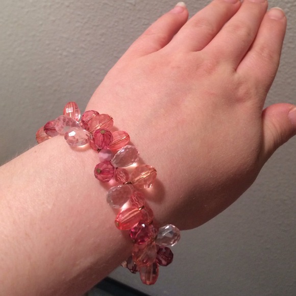 Cute light pink orange and purple bracelet.