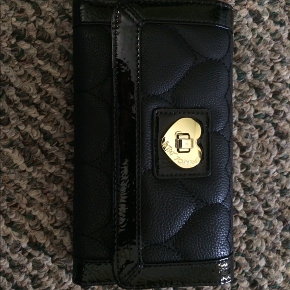 Black Betsey Johnson wallet.