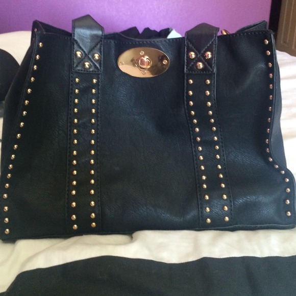Black and gold studded purse