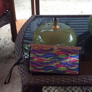 A colorful wallet on hold for ladytaxen