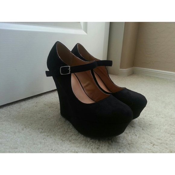 Black suede baby doll wedges