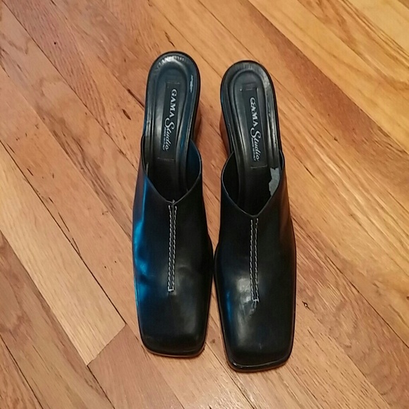 Black wedge mules