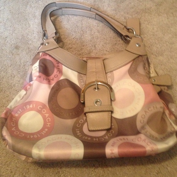 Coach purse.  Three compartments.