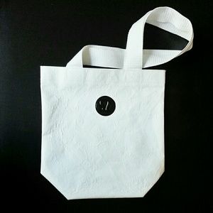 Lululemon white holiday shopping bag