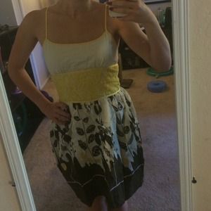 Yellow, brown and cream color dress.