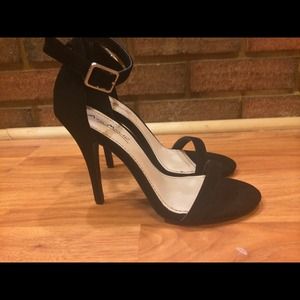 Single strap black heels