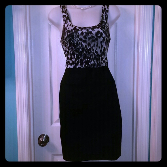 Charlotte Russe Dresses & Skirts - Sexy body con pencil style dress L Animal print