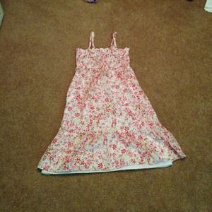 It is a pink and red flower dress
