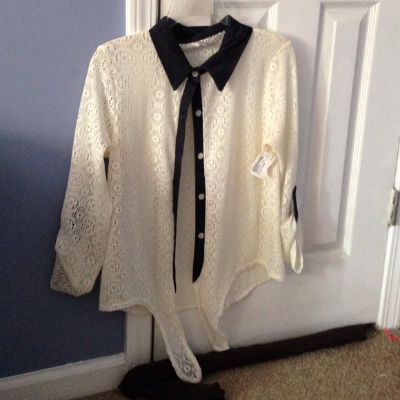 A lace like Topia top with denim trimming