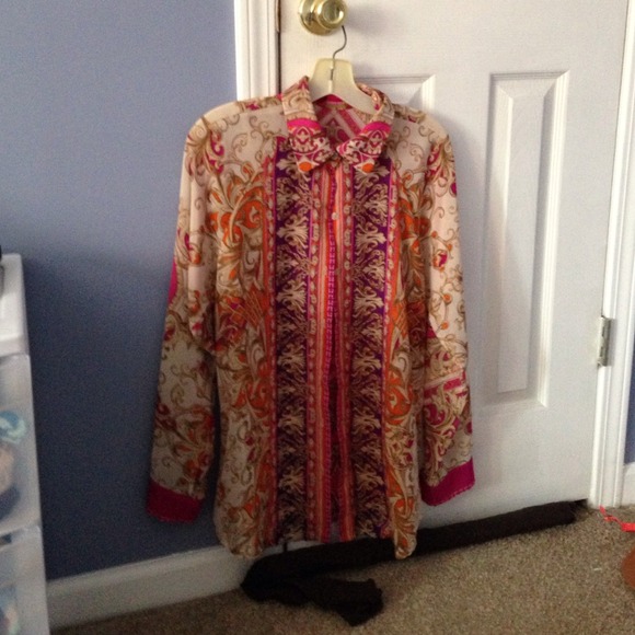 A long sleeve multicolored patterned shirt