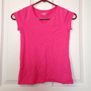 This is a pink t shirt with a mini pocket
