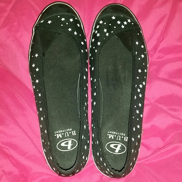 Black and white star slip ons