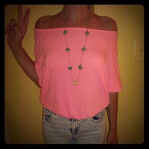 Neon pink off the shoulder top.