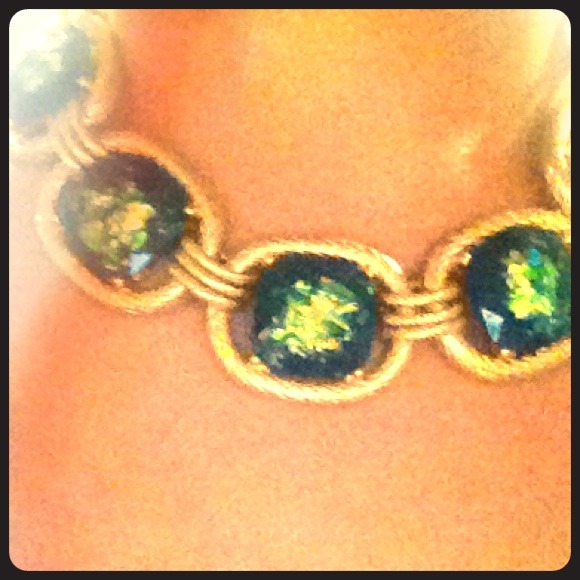 Gold link necklace with blue and gold stones