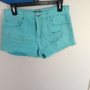 High waisted bright blue shorts!