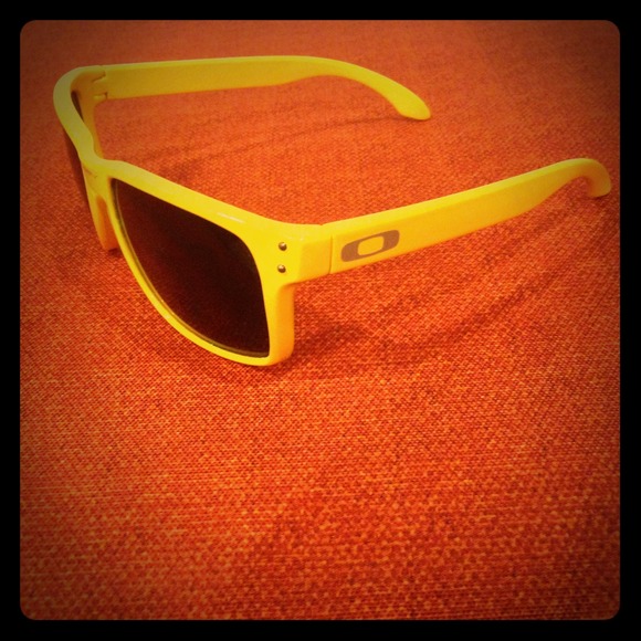 Yellow Oakley sunglasses