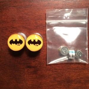 Bright glowing Batman plugs