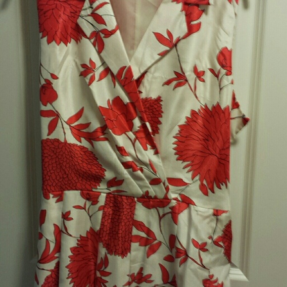 Sleeveless dress worn once with red flowers